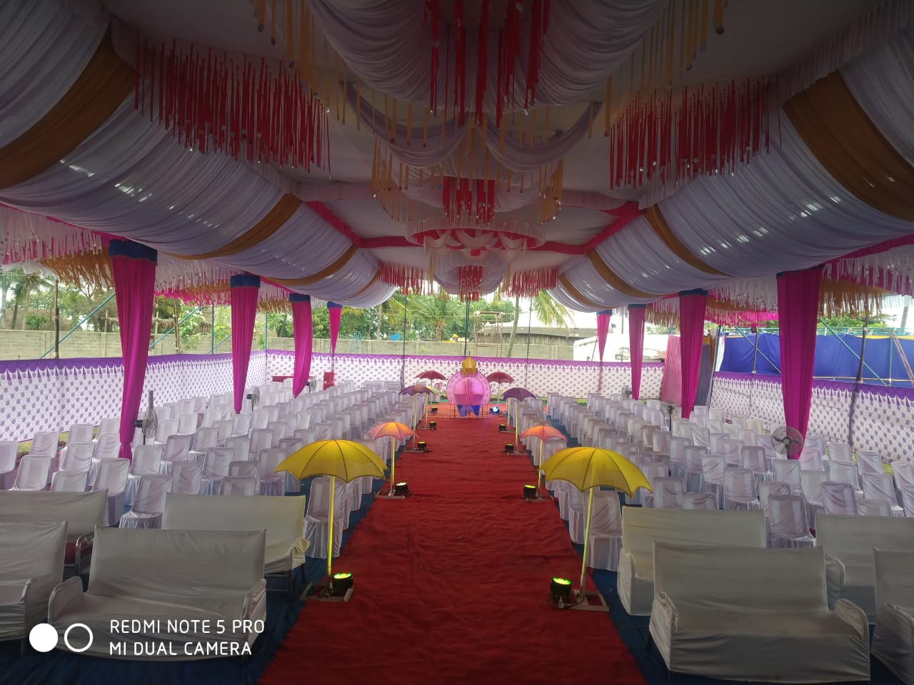 Elegant floral stage decoration by Shrungar Event Management Dharwad.